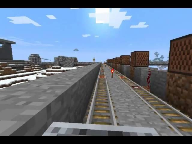 NewColeco's playing Minecraft? showing a big wooden house and a musical railroad?