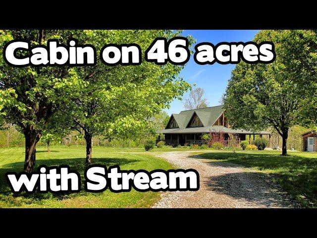 Artist Retreat Log Cabin style home on 46 acres, Barn and Creek