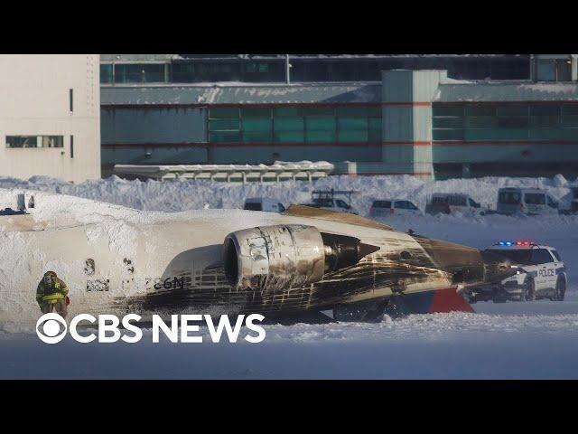 Delta plane flips upside down after crash landing in Toronto, injuries reported