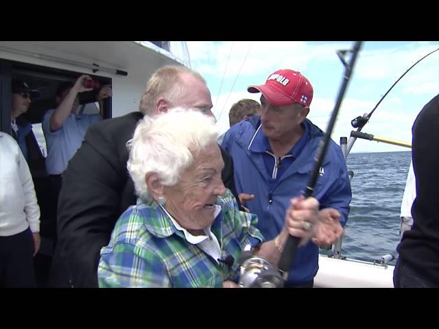 Hazel McCallion lands the big one as Rob Ford and Italo Labignan cheer her on.