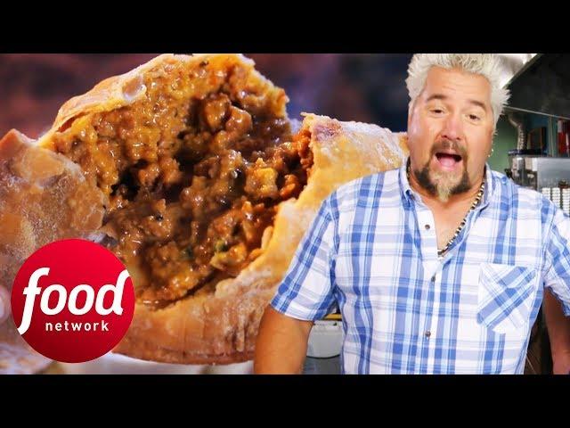 Guy Fieri Can't Get Enough Of This Spicy Sausage Meat Pie! | Diners, Drive-Ins & Dives