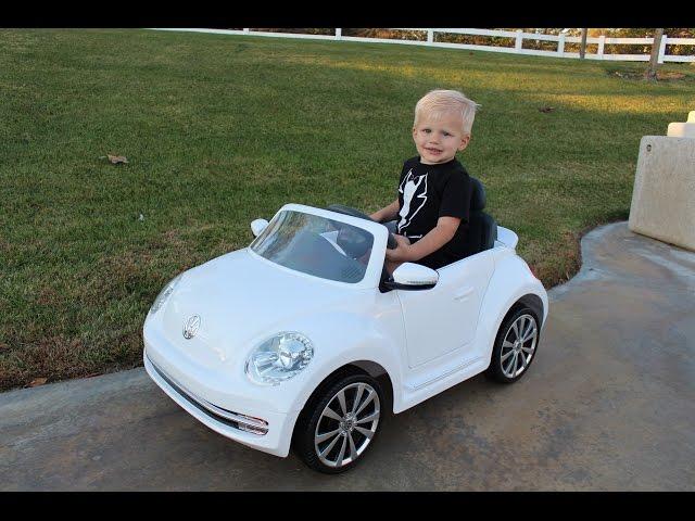 VW Bug Ride-On Car & Lightning McQueen Power Wheels Race