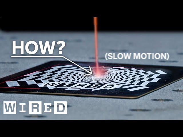 How Do Laser Beams Engrave Things? (slow motion) | WIRED