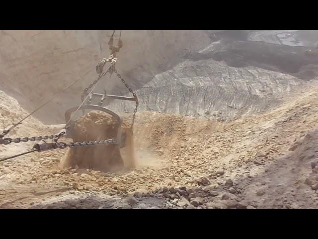 Up Close Digging Coal mine Caterpillar Dragline 8200 Bucket