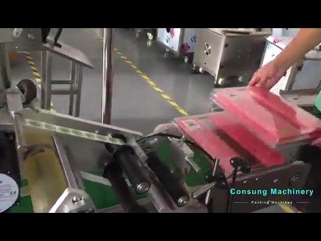 Automatic top surface labeling machine