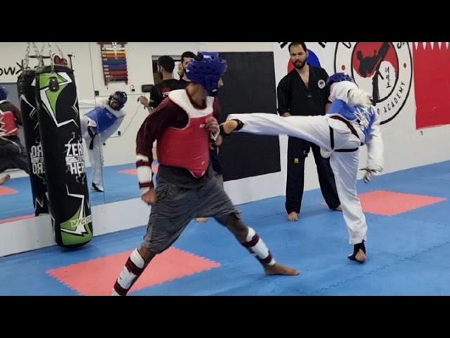 fighting moment for champions taekwondo academy team 