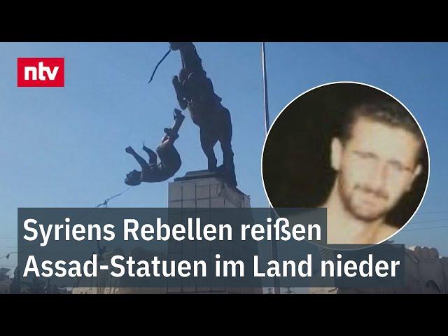 Bilder von Diktator in Badehose: Syriens Rebellen reißen Assad-Statuen im Land nieder | ntv