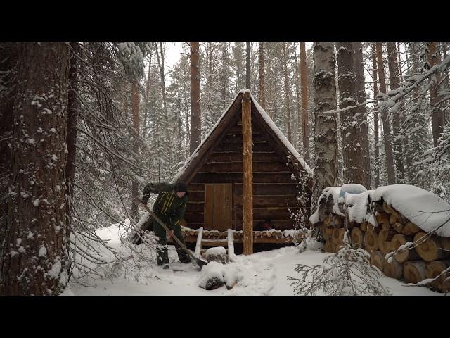 SHELTER FROM SNOWFALL AND FROST IN A COZY LOG CABIN. SURVIVE A NIGHT IN THE WILDERNESS.