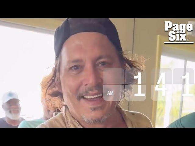 Johnny Depp flashes seemingly new pearly whites after his ‘rotting’ teeth went viral