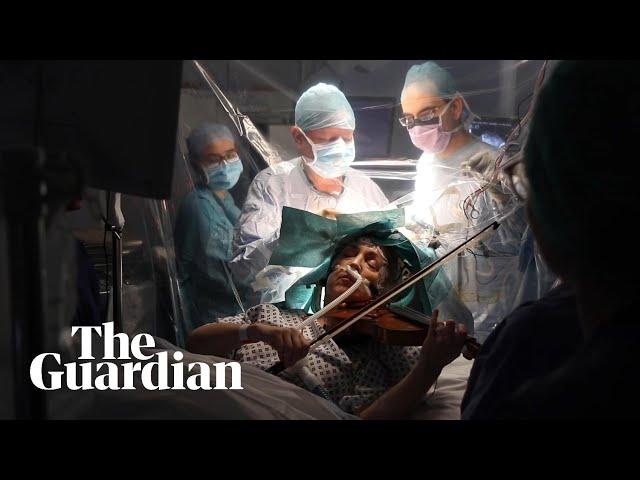 Woman plays violin while undergoing brain surgery