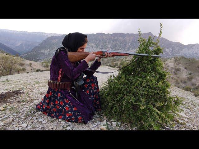 The woman shepherds the children in the mountainous area of the nomadic village