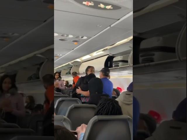 Frontier Airlines passenger gets into fight on plane; tries to bite cops after getting carried off