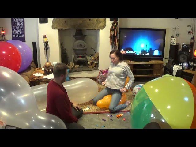 balloon popping couple