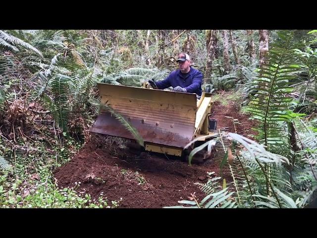 Magnatrac mini dozer trail building