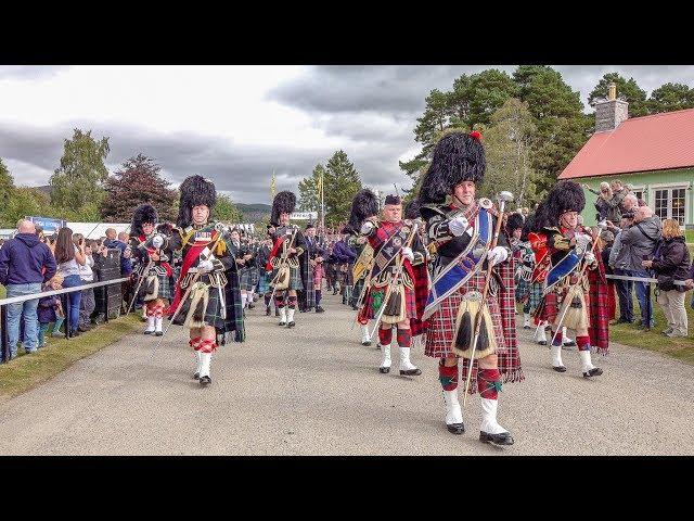 Massed pipes & drums parade to the 2018 Braemar Gathering Royal Highland Games in Scotland (4K)