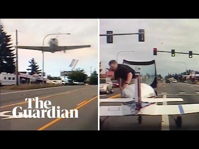 Plane's emergency landing captured on police dashboard camera