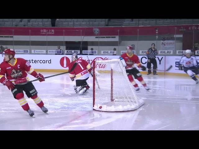 Evgeny Grachyov blasts a puck through the net