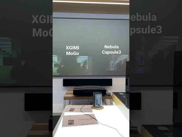 XGIMI MoGo vs. Nebula Capsule 3 mini projector (film in store with all lighting on)