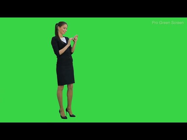 Girl walking with smartphone Green Screen Footage