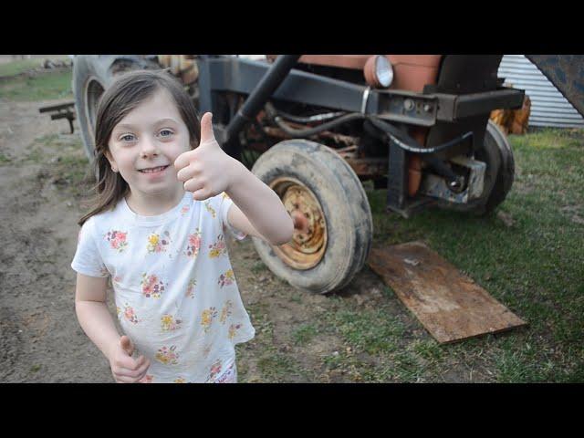 Evelyn and Daddy Repair The Tractor Tire