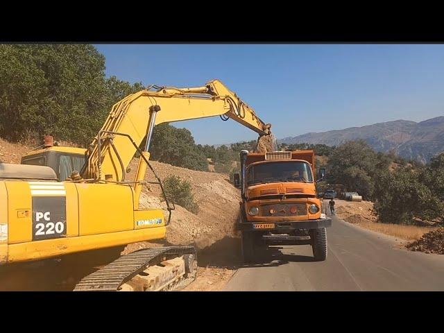 The mood of driving a Benz 2624 truck on the beautiful roads of mountainous areas.