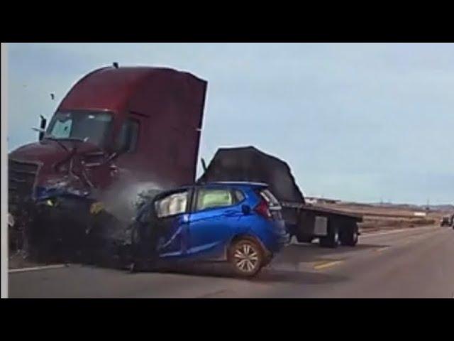 Honda fit turns infront of truck, Utah, 11/12/2022