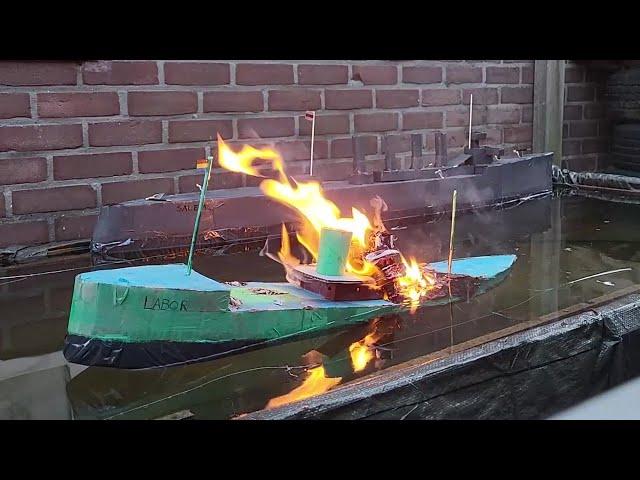 Cardboard Ship Burning And Sinking: Cruiser Salem Versus Merchant Ship Labor