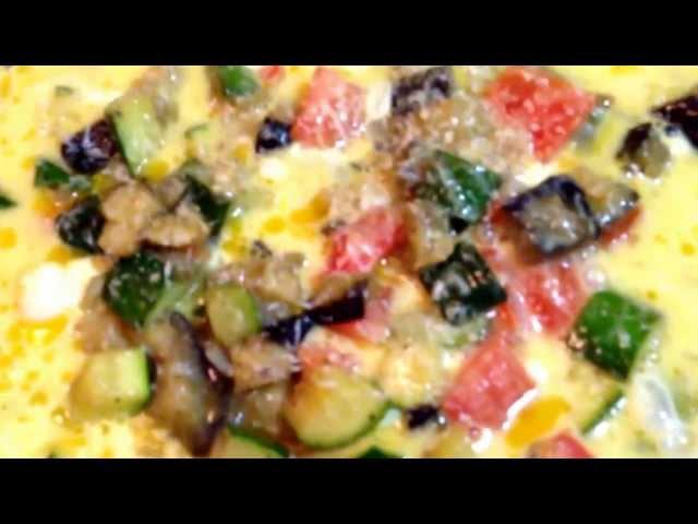 Frittata alla Giovanni Paolo Napolitan style Zucchini Eggplant Onion Tomatoes grated Locatelli Italy