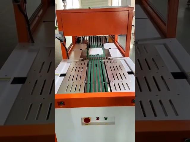 Autoamtic clothing folding and inserting into bag sealing packaging machine