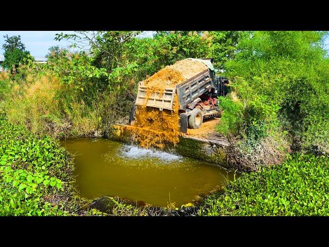 First Start Making Road Landfill in Pond Flooded !! Bulldozer Push Stone ,Truck 5Ton Spreading Stone