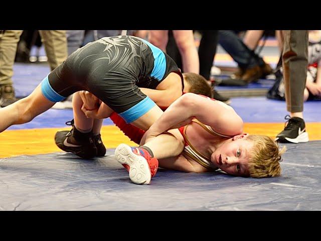 U13 Gavin Arnold (USA) vs Salavat Kaysarov (BEL) 32kg. Freestyle boys wrestling. B-cam-man