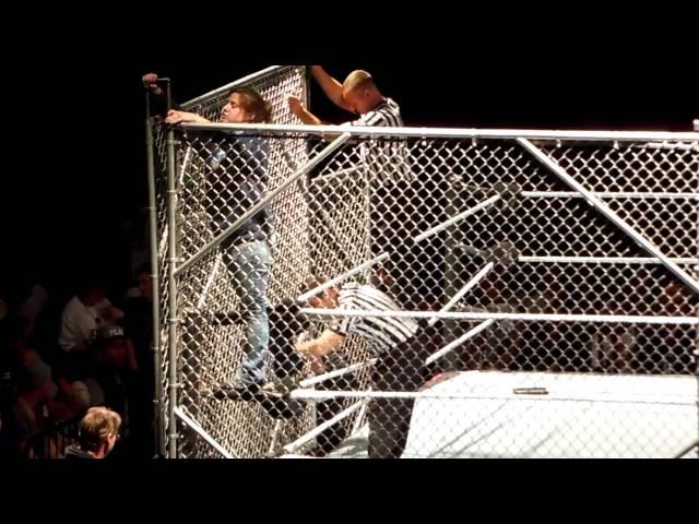 WWE Ring Crew Sets Up the Steel Cage