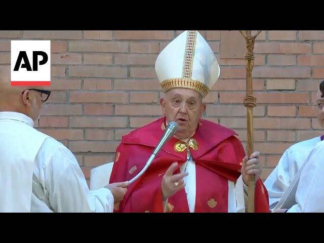 Pope Francis opens  holy door in Rome's penitentiary