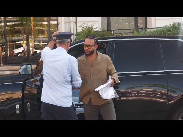 Memphis Depay driving his $450,000 Rolls Royce Cullinan in Monaco