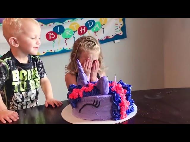 Baby crying because of blowing candles fails.