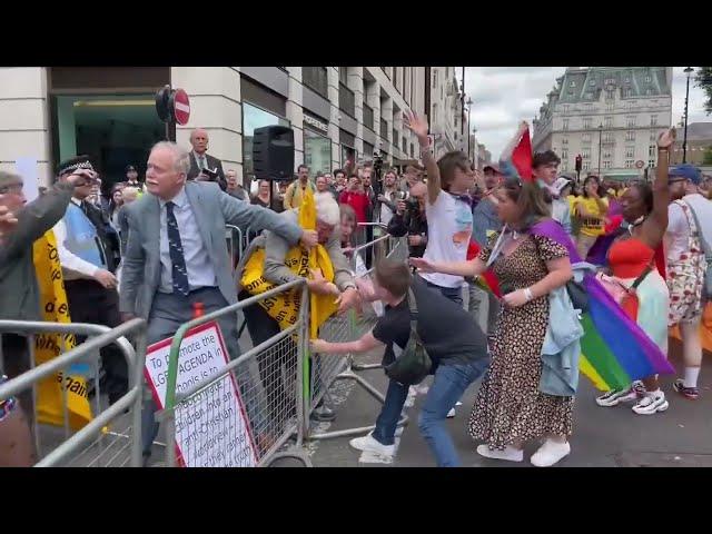 joe locke, sebastian croft, heartstopper cast dancing and flipping off homophobes at london pride