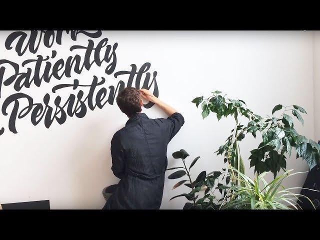 Lettering on wall in our art studio