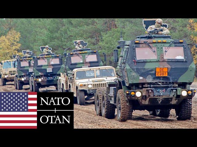 US Army, NATO. Soldiers and armored vehicles during live-fire training in Poland.