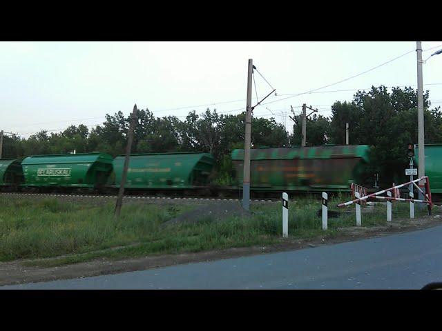 Freight train at a railway crossing