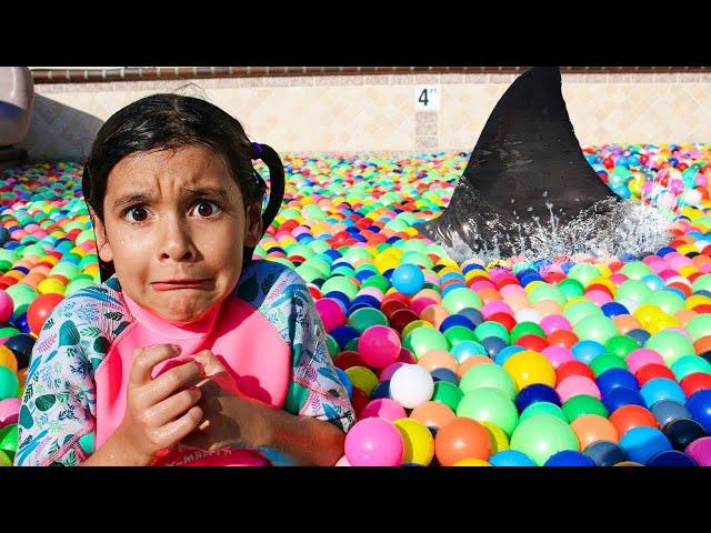 Ellie & Charlotte Ball Pit Shark Surprise in the Swimming Pool