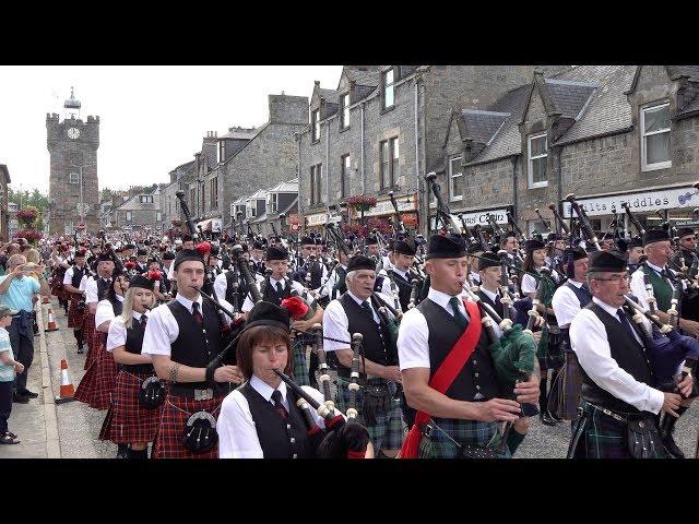 Chieftain leads almost 300 pipers & drummers to the 127th Dufftown Highland Games in Moray, Scotland