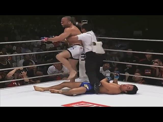 Axe Murderer Wanderlei Silva stomping his head in with a smile on his Face