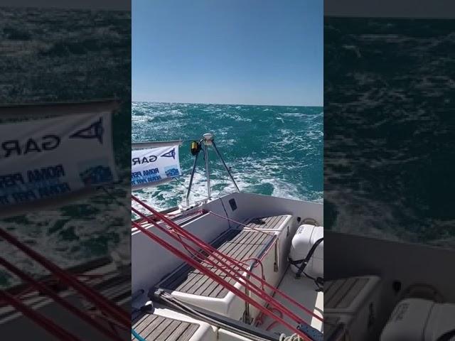 Surfing at 12 knots with First 31.7 sailing boat