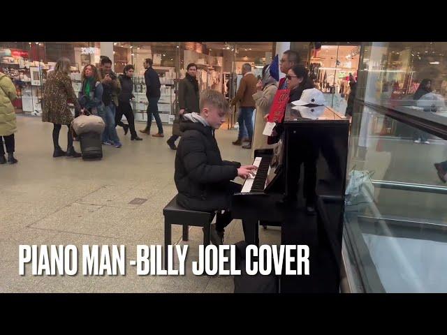 Piano boy plays a cover of Billy Joel’s Piano Man at famous London train station