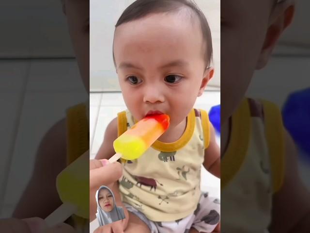 Ekspresi dedek Arash cicip Es Krim Abang Abil  #cutebaby #icecream #walls #jajanan #tuttyfruity