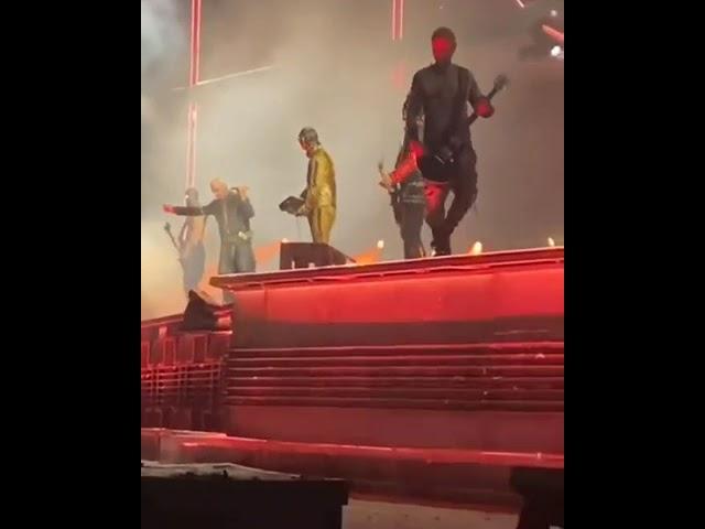 Till Lindemann banging the microphone during Pussy