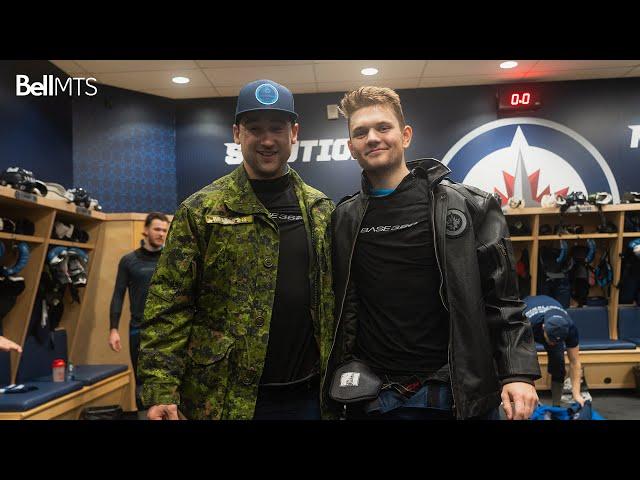 Cole Perfetti finally smiles after receiving Player of the Game jacket