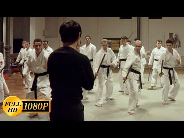 Jet Li versus two dozen karate guys with sticks in a police station / Kiss of the Dragon (2001)