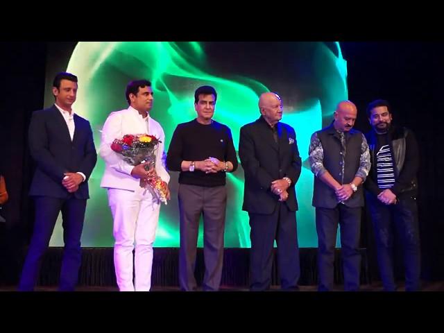 Pt. Pawan Kaushik being felicitated by bollywood personalities at an event