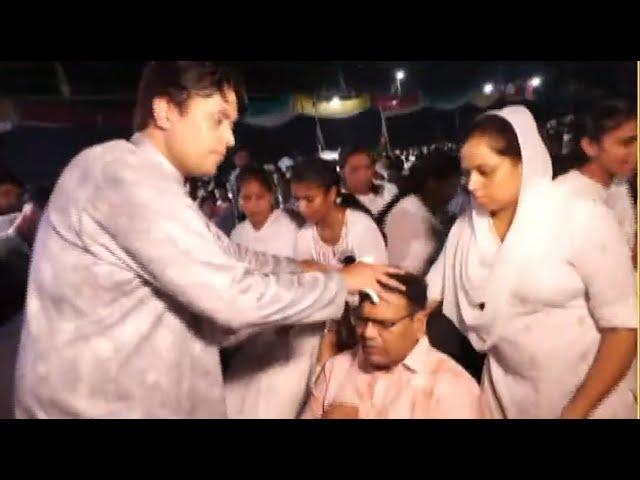 APOSTLE ANKUR NARULA LAYING HAND ON PASTOR MANISH GILL